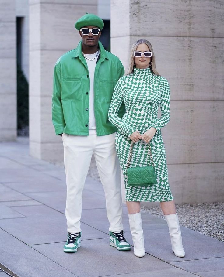 this image shows two green outfits